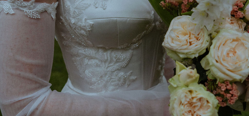 Maryke Bespoke Corset Wedding Dress with exquisite lace applique detail in luxurious Duchess Satin