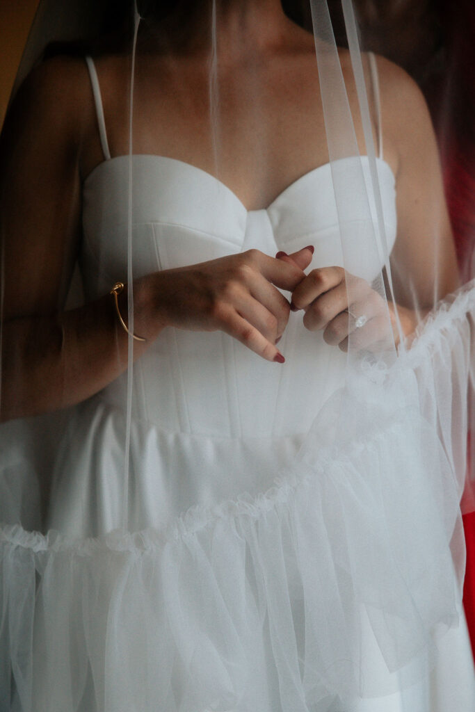 Elegant Satin Corset Wedding Dress with exposed boning and bow detail